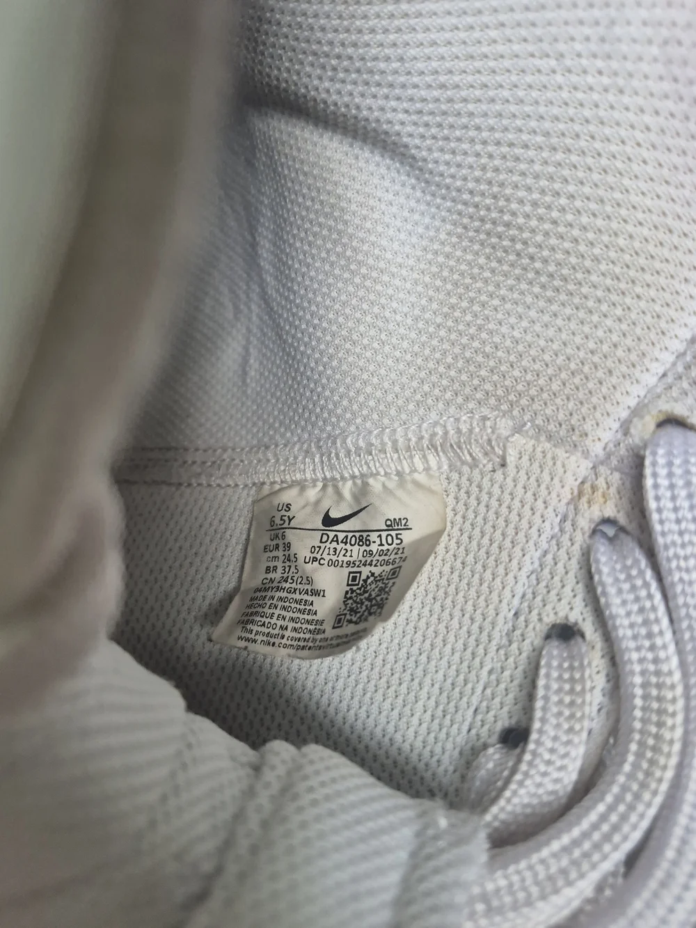 Nike Blazers Kid's White High-Top Sneakers with Pink Swoosh Accent